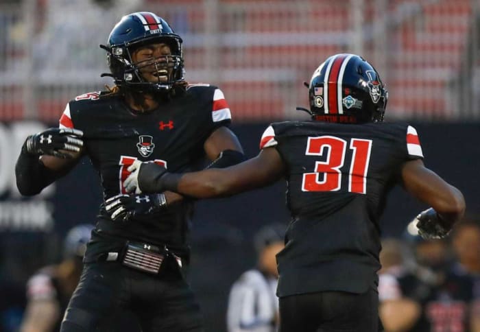Austin Peay Governors defensive back Shamari Simmons (16) and other player celebrate a touchdown interception during an OVC football game between the Austin Peay Governors and Tennessee Tech Golden Eagles at Fortera Stadium in Clarksville, Tenn., on Saturday, Nov. 20, 2021.